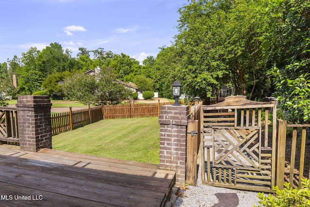 316 Meadow Creek Pl, Jackson, MS 39211 - wooden deck featuring a gate and view of scattered trees