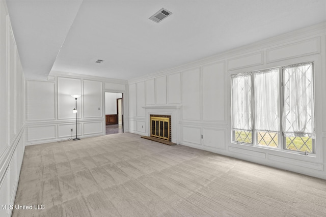 316 Meadow Creek Pl, Jackson, MS 39211 - unfurnished living room featuring a decorative wall, light carpet, and a brick fireplace