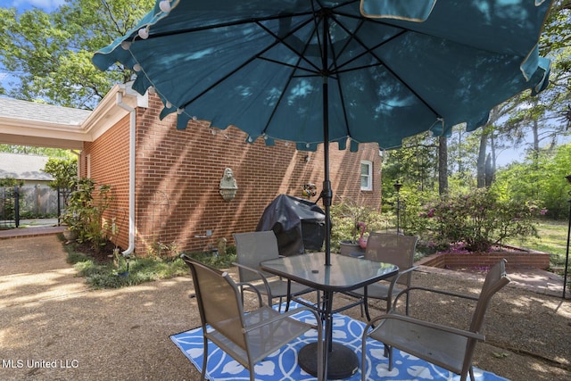 39 Moss Forest Cir, Jackson, MS 39211 - view of patio / terrace with outdoor dining space and grilling area