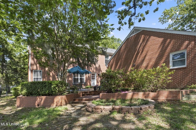 39 Moss Forest Cir, Jackson, MS 39211 - rear view of house featuring brick siding