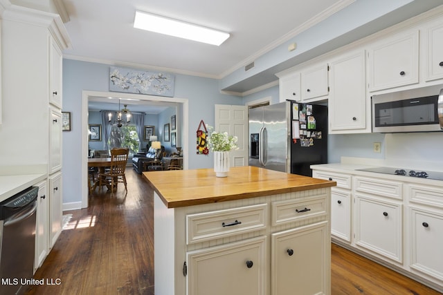 39 Moss Forest Cir, Jackson, MS 39211 - kitchen featuring dark wood finished floors, visible vents, stainless steel appliances, and butcher block counters
