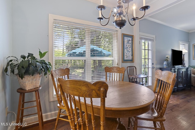 39 Moss Forest Cir, Jackson, MS 39211 - dining area featuring crown molding, a chandelier, and wood finished floors