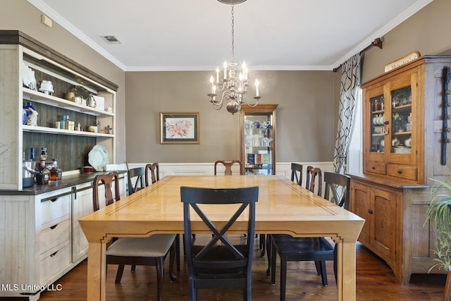 39 Moss Forest Cir, Jackson, MS 39211 - dining space with dark wood-style floors, visible vents, ornamental molding, and a notable chandelier