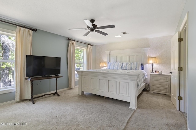 39 Moss Forest Cir, Jackson, MS 39211 - bedroom with a ceiling fan, visible vents, light colored carpet, and baseboards