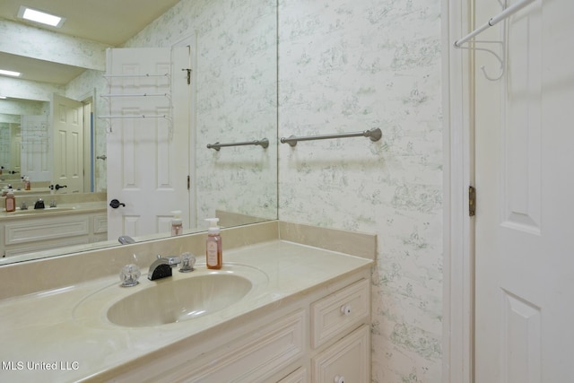 39 Moss Forest Cir, Jackson, MS 39211 - full bath featuring wallpapered walls and vanity