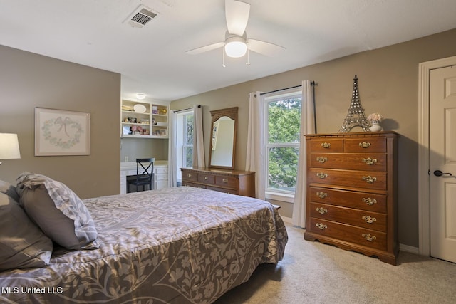 39 Moss Forest Cir, Jackson, MS 39211 - bedroom with a ceiling fan, visible vents, and light carpet