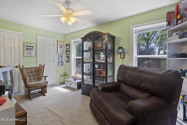 39 Moss Forest Cir, Jackson, MS 39211 - sitting room featuring carpet flooring, ceiling fan, and a wealth of natural light