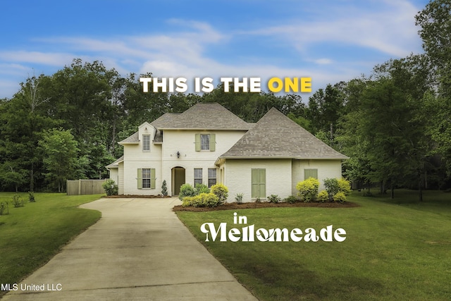 413 Miles Cv, Brandon, MS 39047 - view of front facade with concrete driveway and roof with shingles