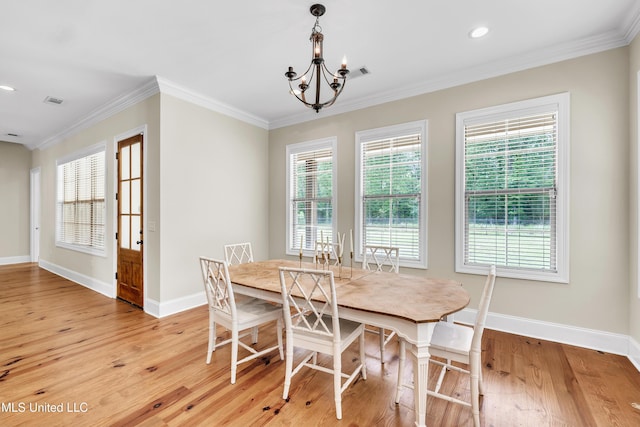 413 Miles Cv, Brandon, MS 39047 - dining room with a chandelier, baseboards, light wood-type flooring, crown molding, and recessed lighting