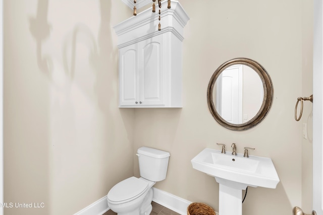 413 Miles Cv, Brandon, MS 39047 - bathroom featuring toilet and baseboards