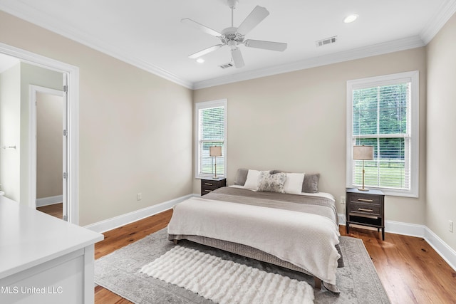 413 Miles Cv, Brandon, MS 39047 - bedroom featuring multiple windows, light wood-style floors, crown molding, recessed lighting, and baseboards
