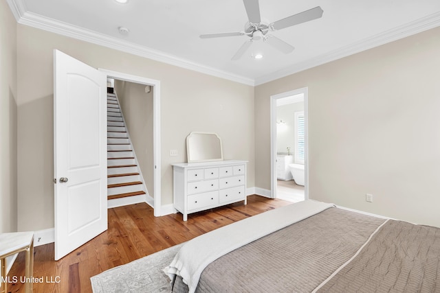 413 Miles Cv, Brandon, MS 39047 - bedroom featuring wood finished floors, ornamental molding, recessed lighting, baseboards, and connected bathroom