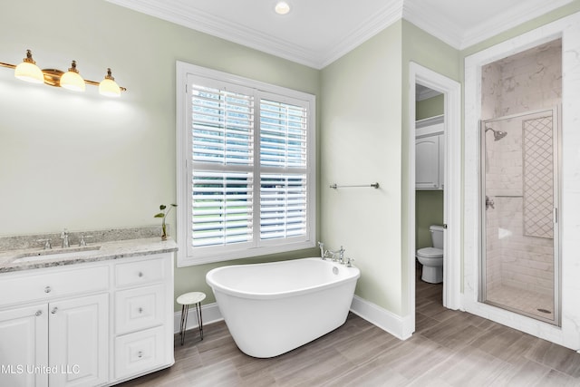 413 Miles Cv, Brandon, MS 39047 - bathroom featuring a shower stall, a soaking tub, healthy amount of natural light, ornamental molding, and recessed lighting