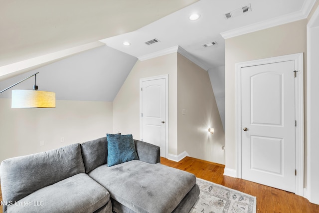 413 Miles Cv, Brandon, MS 39047 - sitting room with wood finished floors, ornamental molding, recessed lighting, baseboards, and lofted ceiling