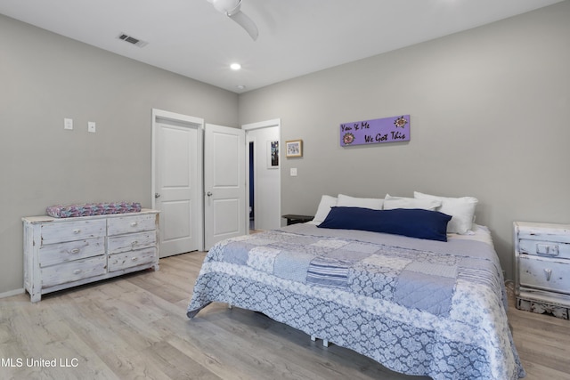 bedroom featuring visible vents, recessed lighting, baseboards, and wood finished floors