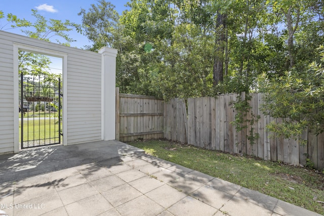 view of patio / terrace with fence