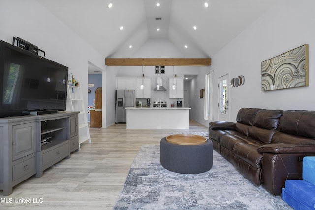 living room with recessed lighting, high vaulted ceiling, visible vents, and light wood-type flooring