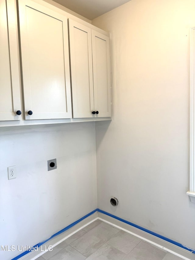 6 Hedges Plantation Pl, Natchez, MS 39120 - washroom with electric dryer hookup, cabinet space, and baseboards