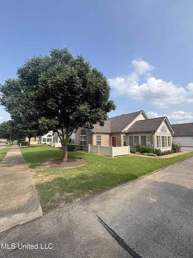 8911 Oak Branch Ln, Olive Branch, MS 38654 - ranch-style home with a front lawn and brick siding