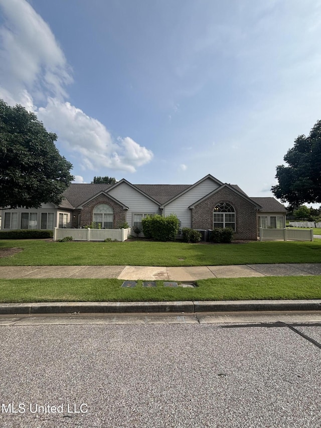 8911 Oak Branch Ln, Olive Branch, MS 38654 - ranch-style home featuring brick siding
