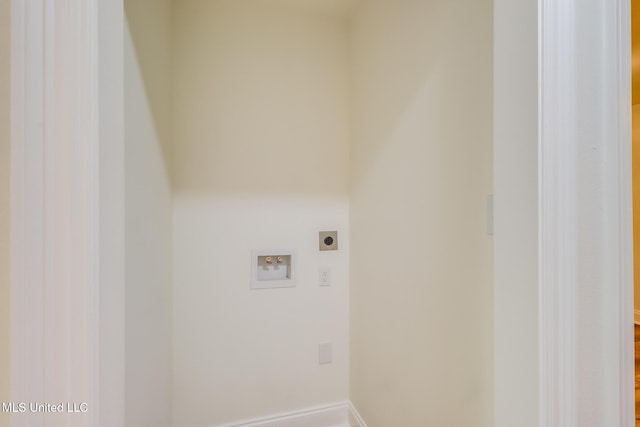 11014 Gannet St, Bay Saint Louis, MS 39520 - washroom featuring electric dryer hookup, hookup for a washing machine, and baseboards
