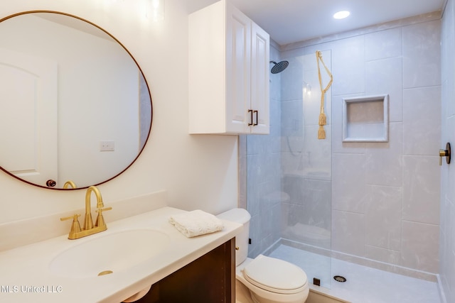 11014 Gannet St, Bay Saint Louis, MS 39520 - full bathroom with a tile shower, vanity, toilet, and recessed lighting