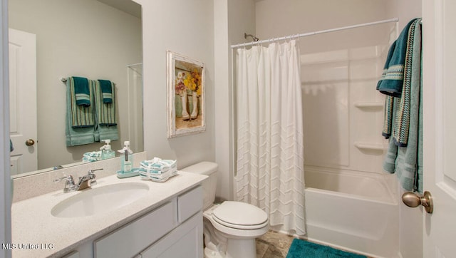 full bathroom featuring toilet, vanity, and shower / bathtub combination with curtain