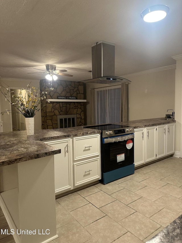 kitchen featuring white cabinetry, island range hood, stainless steel electric stove, and crown molding