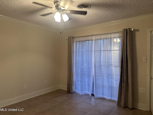 spare room with ornamental molding, a textured ceiling, and ceiling fan