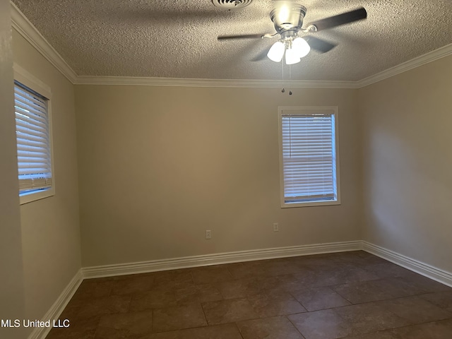 spare room featuring ceiling fan, ornamental molding, and a textured ceiling