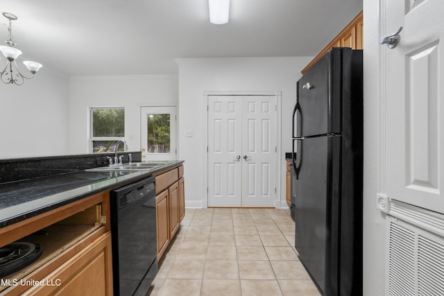 kitchen featuring sink, light tile patterned floors, crown molding, an inviting chandelier, and black appliances