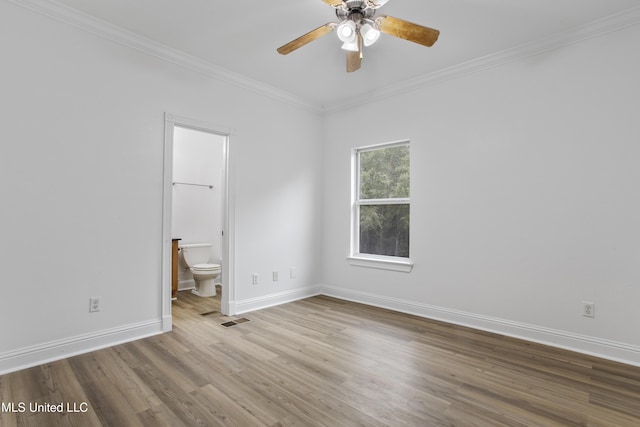 unfurnished room featuring ornamental molding, hardwood / wood-style floors, and ceiling fan