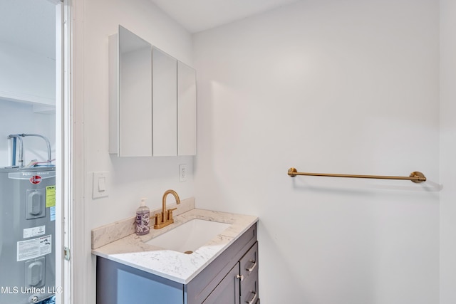 bathroom with vanity and water heater