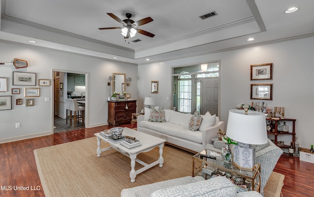 221 Boxwood Cir, Brandon, MS 39047 - living area featuring a raised ceiling, ornamental molding, ceiling fan, wood finished floors, and recessed lighting
