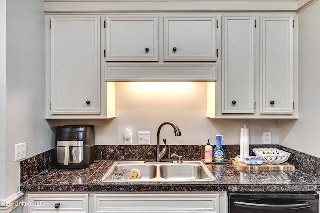 221 Boxwood Cir, Brandon, MS 39047 - kitchen featuring a sink, black dishwasher, tile countertops, and white cabinets