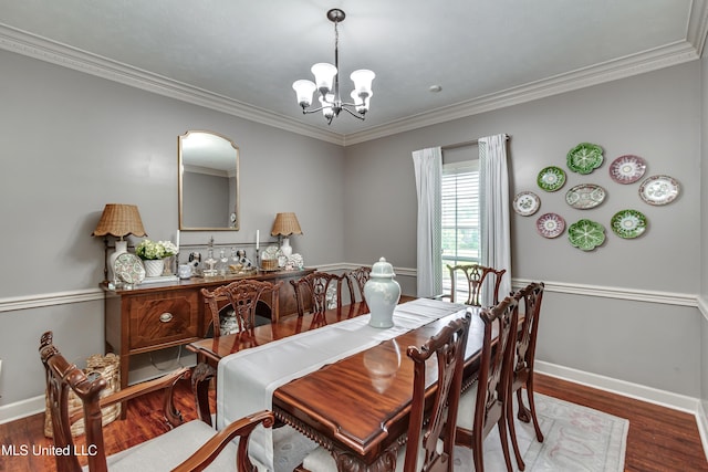 221 Boxwood Cir, Brandon, MS 39047 - dining room featuring a chandelier, wood finished floors, baseboards, and ornamental molding