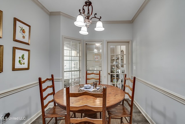 221 Boxwood Cir, Brandon, MS 39047 - dining space featuring crown molding, a chandelier, baseboards, and tile patterned floors