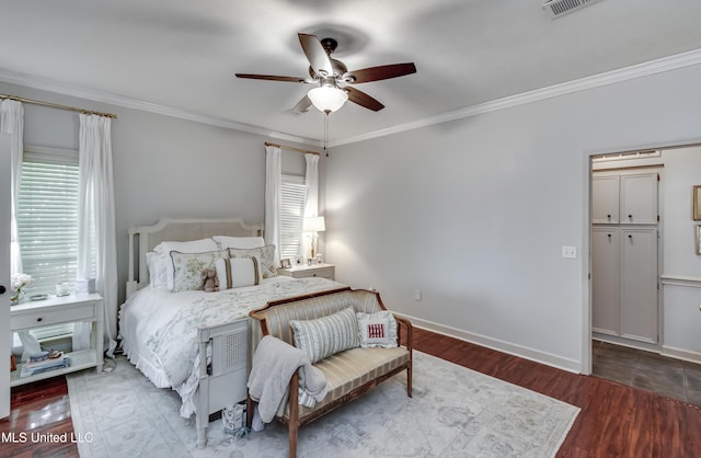 221 Boxwood Cir, Brandon, MS 39047 - bedroom with multiple windows, ornamental molding, wood finished floors, baseboards, and ceiling fan