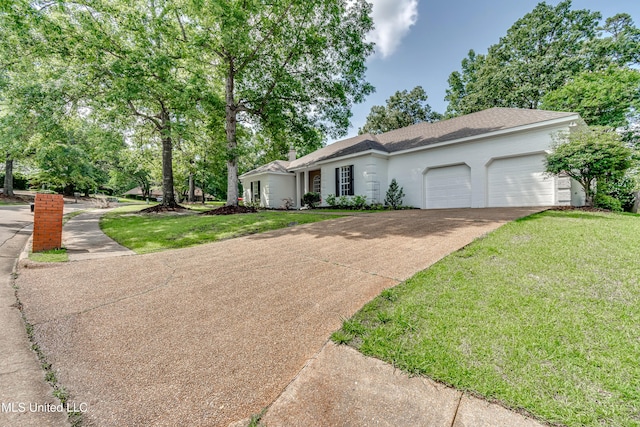 221 Boxwood Cir, Brandon, MS 39047 - ranch-style house with an attached garage, concrete driveway, and a front yard