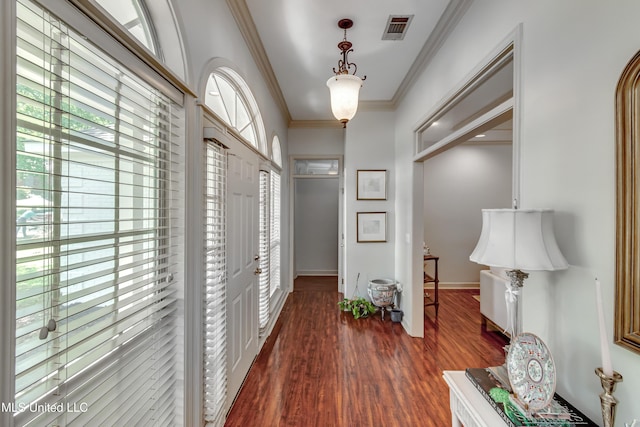 221 Boxwood Cir, Brandon, MS 39047 - foyer entrance featuring crown molding, wood finished floors, and baseboards