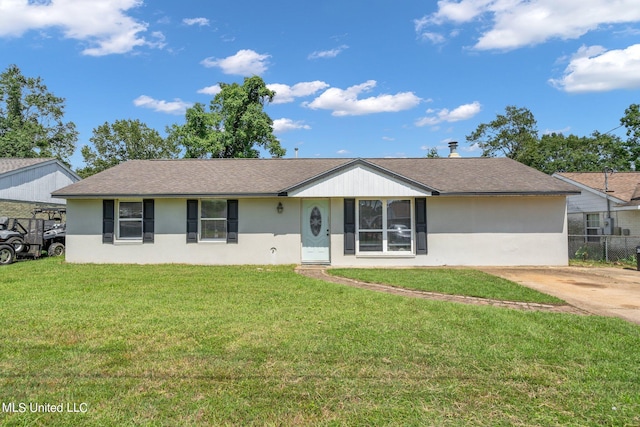 ranch-style home with a front lawn