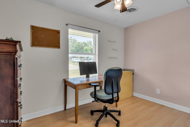 office area featuring light hardwood / wood-style flooring and ceiling fan