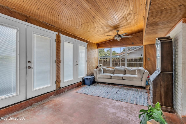 unfurnished sunroom featuring french doors, wood ceiling, vaulted ceiling, and ceiling fan