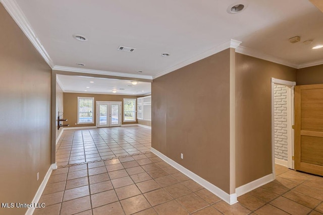 interior space with french doors and ornamental molding