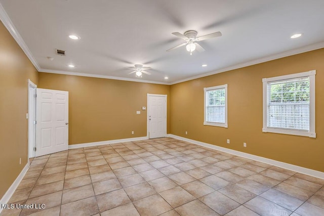 empty room with ceiling fan, light tile patterned flooring, and ornamental molding