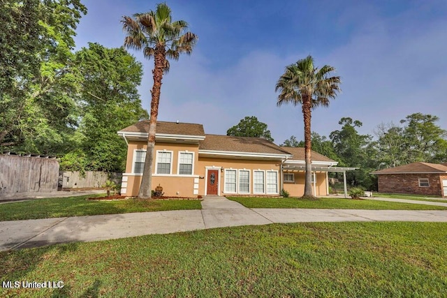 view of front of house with a front lawn