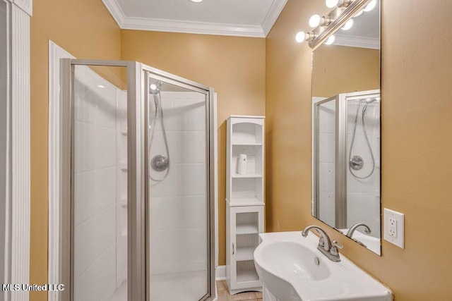 bathroom with crown molding and walk in shower