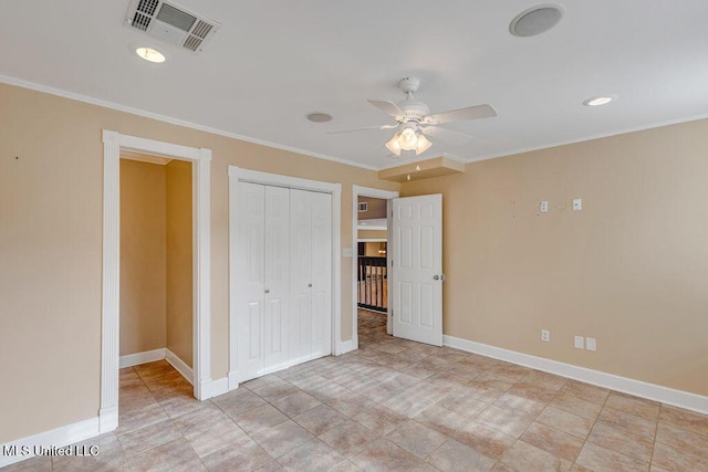 unfurnished bedroom featuring ceiling fan, light tile patterned floors, crown molding, and a closet