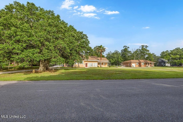 19 Poplar Cir, Gulfport, MS 39507 - view of front of property featuring a front lawn