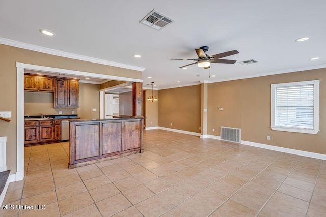 kitchen with ceiling fan with notable chandelier, light tile patterned flooring, ornamental molding, and hanging light fixtures